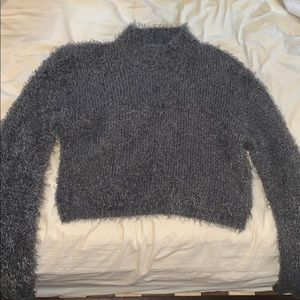 Long sleeved, mock neck, cropped sweater